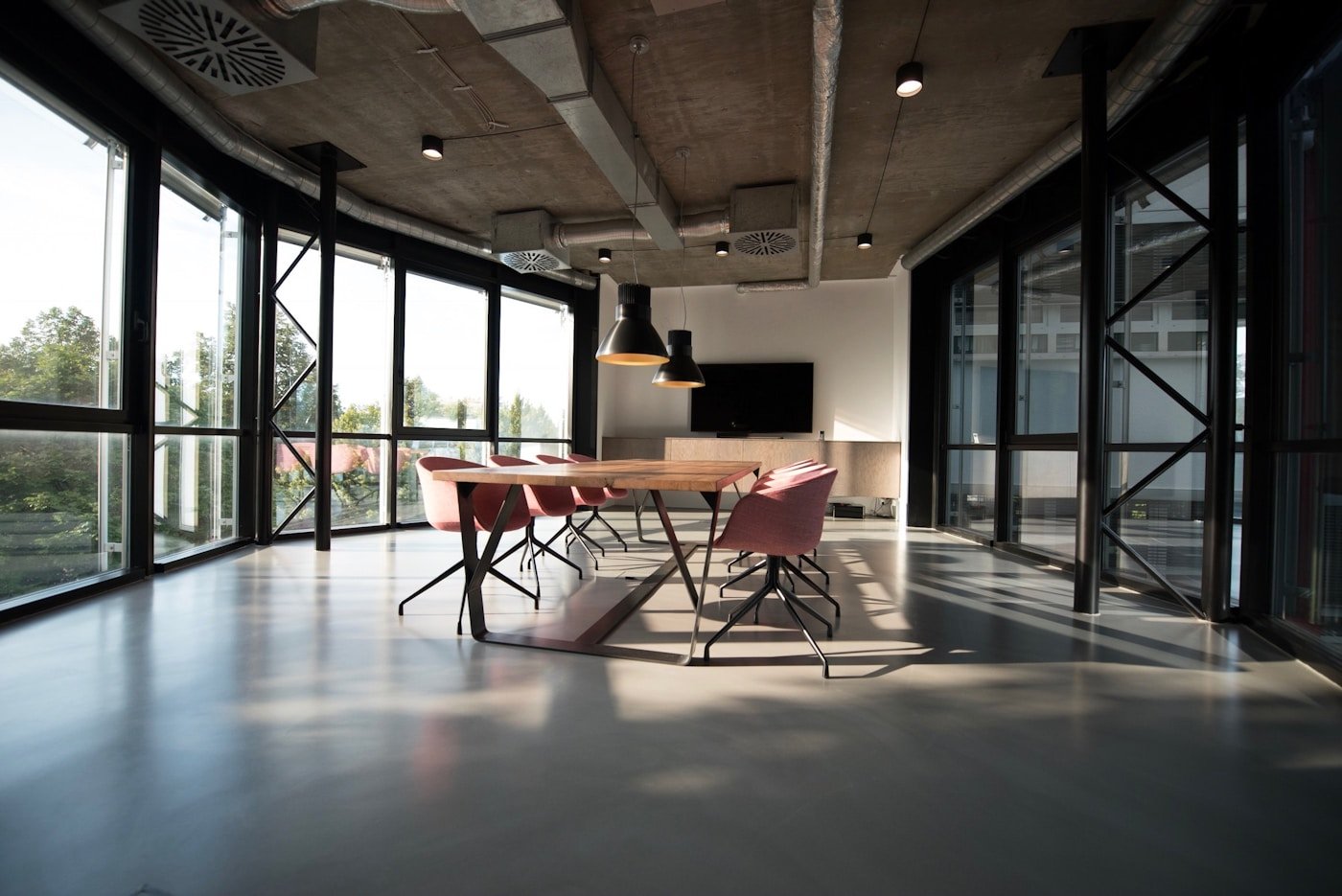 Creative studio showcasing digital project deliverables on screen