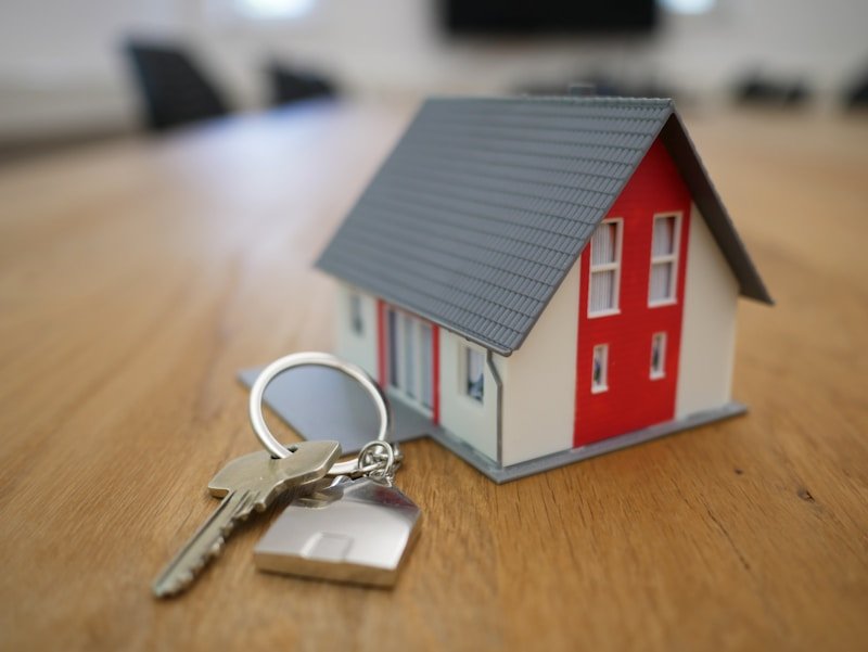 Real estate brand identity applied to property marketing materials